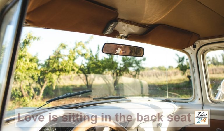 Sitting in the back seat…